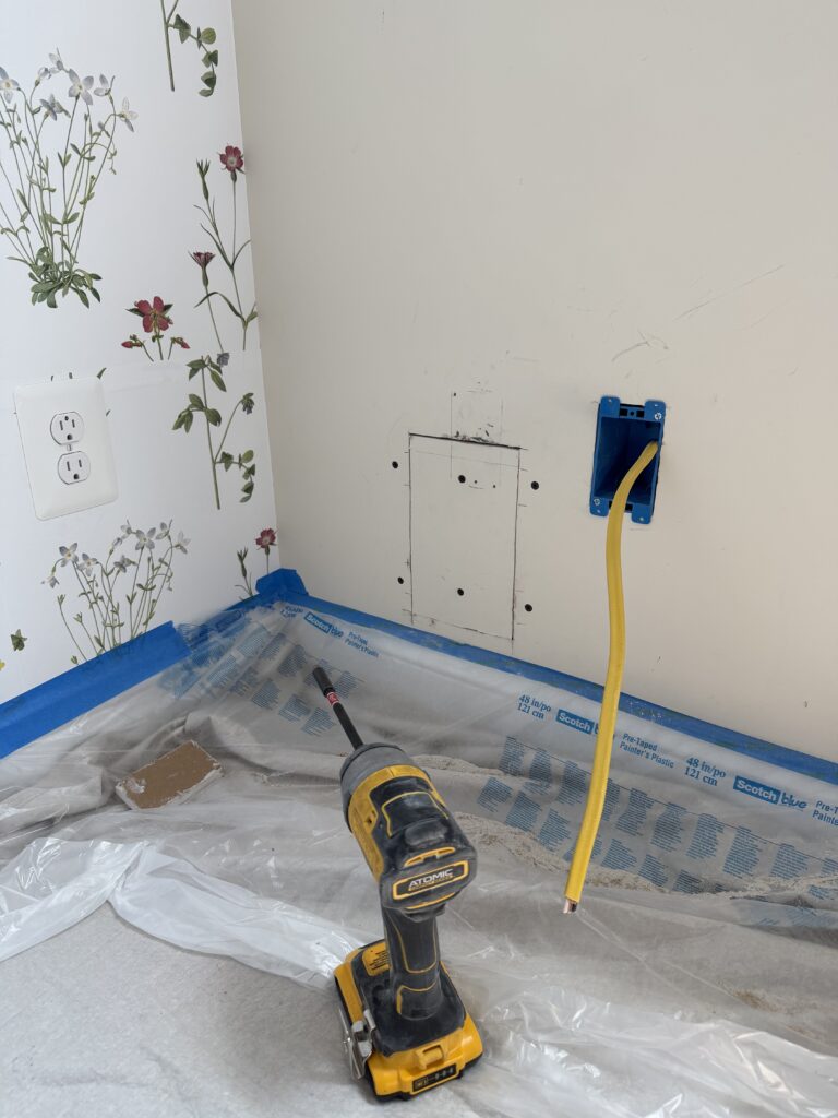 Bedroom outlet box with new dedicated circuit wiring during installation in Broadlands, VA